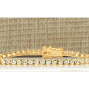 4.45 CTW Natural Diamond Bracelet In 14k Yellow Gold: 4.45 CTW Natural Diamond Bracelet In 14k Yellow Gold Manufacturer's Suggested Retail Price: $ 8500.00 Stamped: 14K Bracelet Width: 2.75mm Bracelet Length: 7.0 Inches Total Bracelet