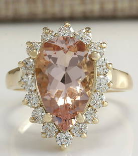 5.00 CTW Natural Peach Morganite And Diamond Ring In 14K Solid Yellow Gold: 5.00 CTW Natural Peach Morganite And Diamond Ring In 14K Solid Yellow Gold Manufacturer's Suggested Retail Price: $ 3800.00 Stamped: 14K Ring Size: 6.75 Total Ring Weight: 5.6Grams Diamond