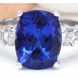 6.83 CTW Natural Tanzanite 18K Solid White Gold Diamond Ring: 6.83 CTW Natural Tanzanite 18K Solid White Gold Diamond Ring Manufacturer's Suggested Retail Price: $ 6200.00 6.83 Carat Natural Tanzanite 18K Solid White Gold Diamond Ring Item Type: Ring 