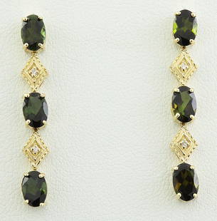 2.65 CTW Tourmaline 14K Yellow Gold Diamond Earrings: 2.65 CTW Tourmaline 14K Yellow Gold Diamond Earrings Manufacturer's Suggested Retail Price: $ 1700.00 Stamped: 14K Total Earrings Weight: 1.6 Grams Tourmaline Weight: 2.60 Carat (6.00x4.00