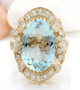 5.8 CTW Natural Aquamarine 14K Solid Yellow Gold Diamond Ring: 5.8 CTW Natural Aquamarine 14K Solid Yellow Gold Diamond Ring Manufacturer's Suggested Retail Price: $ 3600.00 5.8 Carat Natural Aquamarine 14K Solid Yellow Gold Diamond Ring Item Type: Ring 