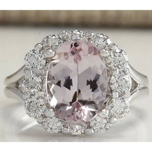 3.70 CTW Natural Peach Morganite And Diamond Ring In 18K Solid White Gold: 3.70 CTW Natural Peach Morganite And Diamond Ring In 18K Solid White Gold Manufacturer's Suggested Retail Price: $ 4700.00 Stamped: 18K Ring Size: 5 Total Ring Weight: 6.1Grams Diamond