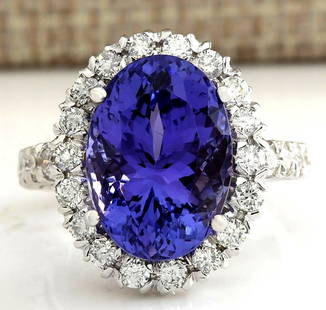10.66 CTW Natural Blue Tanzanite And Diamond Ring In 14K White Gold: 10.66 CTW Natural Blue Tanzanite And Diamond Ring In 14K White Gold Manufacturer's Suggested Retail Price: $ 8700.00 Stamped: 14K Ring Size: 6.75 Total Ring Weight: 7.7 Grams Diamond Weight: