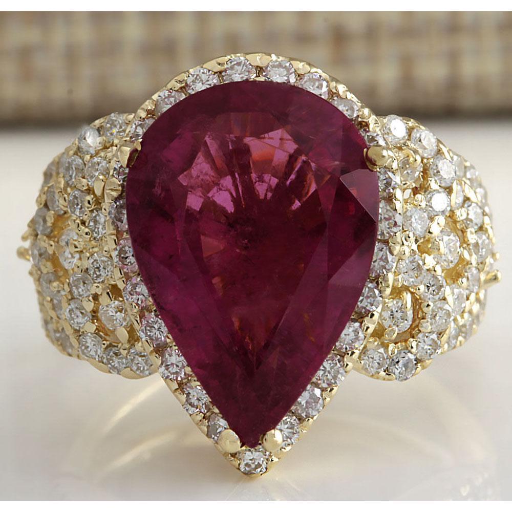 8.27 CTW Natural Rubelite And Diamond Ring 18K Solid Yellow Gold: 8.27 CTW Natural Rubelite And Diamond Ring 18K Solid Yellow Gold Manufacturer's Suggested Retail Price: $ 7500.00 Stamped: 18K Ring Size: 6.25 Total Ring Weight: 8.3 Grams Diamond Weight: Total Natura