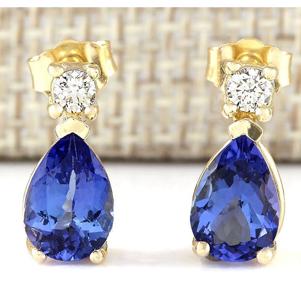 3.40 CTW Natural Tanzanite And Diamond Earrings 14k Solid Yellow Gold: 3.40 CTW Natural Tanzanite And Diamond Earrings 14k Solid Yellow Gold Manufacturer's Suggested Retail Price: $ 3300.00 Stamped: 14K Total Earring Weight: 3.8Grams Diamond Weight: Total Natural diamond