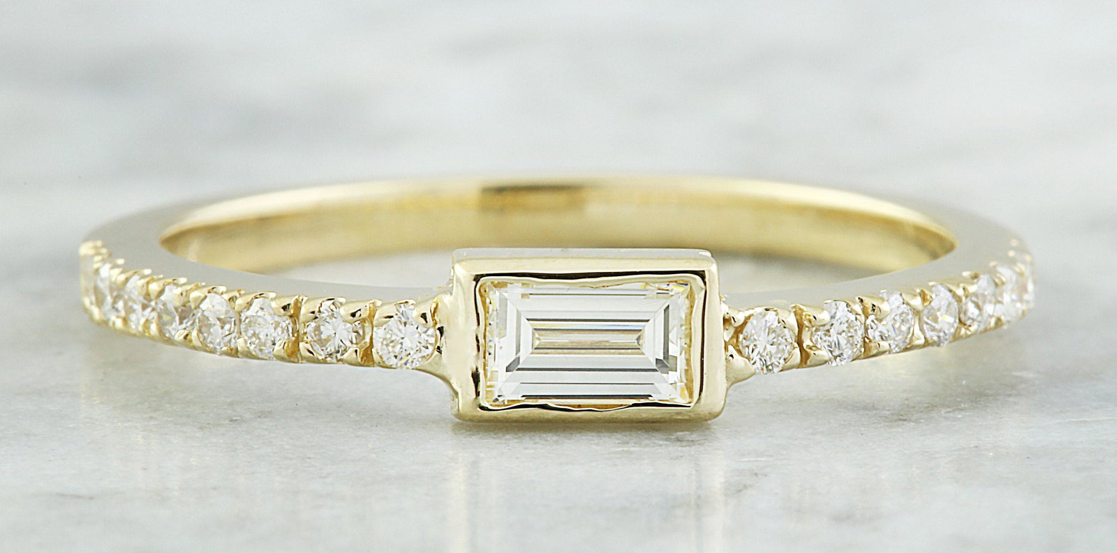 0.38 CTW Diamond 18K Yellow Gold ring: 0.38 CTW Diamond 18K Yellow Gold ring Manufacturer's Suggested Retail Price: $ 2300.00 Stamped: 18K Total Ring Weight: 2 Grams Center Diamond Weight 0.20 Carat Side Diamond Weight: 0.18 carat (F-G Col