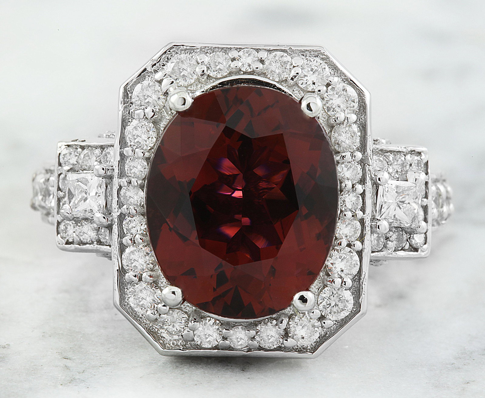 6.00 CTW Tourmaline 14k White Gold Diamond Ring: 6.00 CTW Tourmaline 14k White Gold Diamond Ring Manufacturer's Suggested Retail Price: $ 5300.00 Stamped: 14K Total Ring Weight: 10.4 Grams Tourmaline Weight 5.00 Carat (12.40x10.40 Millimeters) Diamo