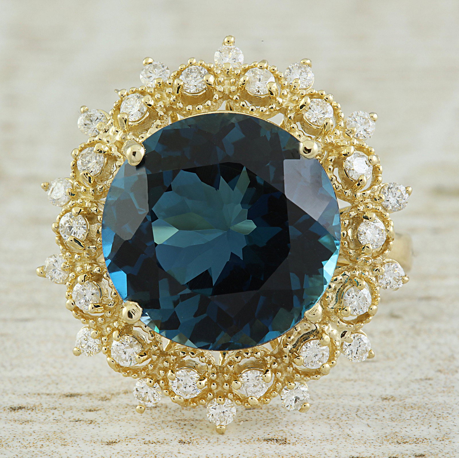 10.00 CTW Topaz 18K Yellow Gold Diamond Ring: 10.00 CTW Topaz 18K Yellow Gold Diamond Ring Manufacturer's Suggested Retail Price: $ 3200.00 Stamped: 18K Ring Size: 7 Total Ring Weight: 5.1 Grams Topaz Weight: 9.50 Carat (13.00x13.00 Millimeter) D