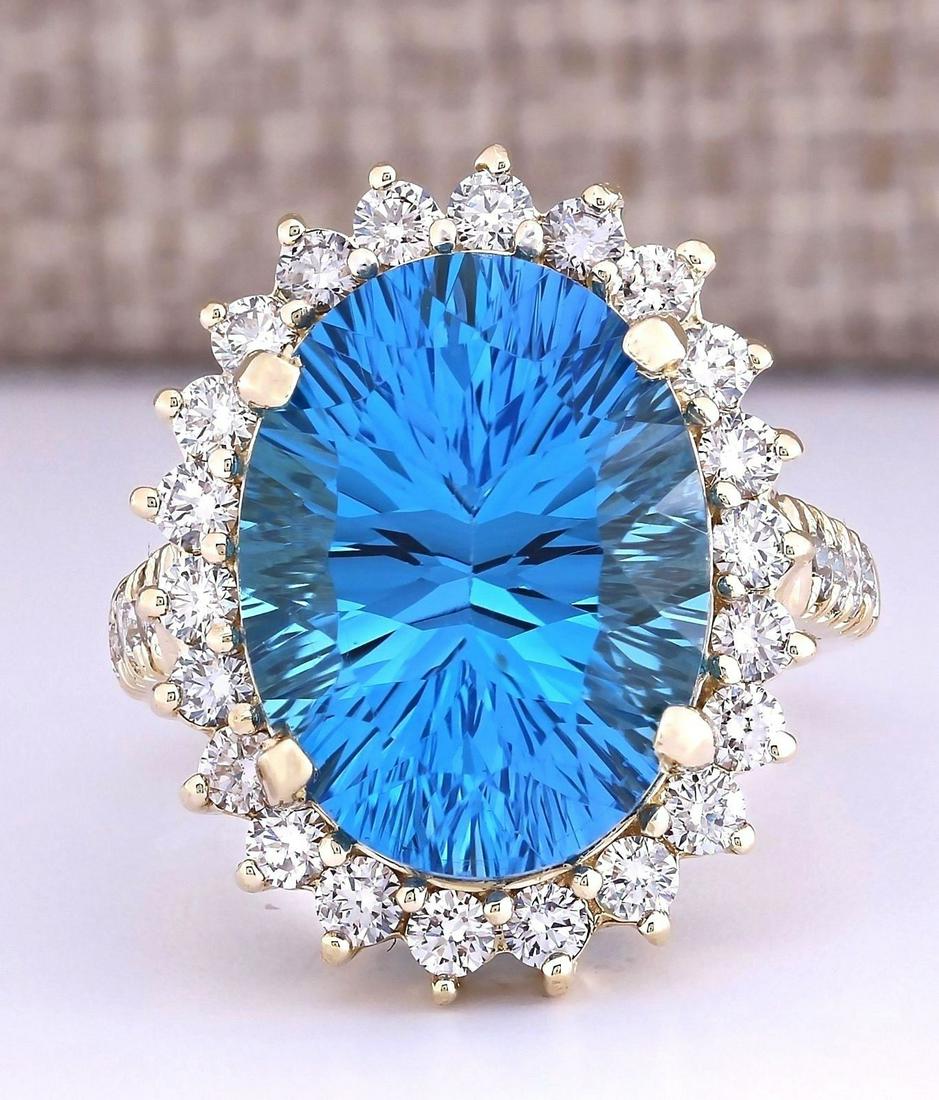 13.02 CTW Natural Blue Topaz And Diamond Ring In 18K Yellow Gold: 13.02 CTW Natural Blue Topaz And Diamond Ring In 18K Yellow Gold Manufacturer's Suggested Retail Price: $ 5100.00 Stamped: 18K Ring Size: 6.25 Total Ring Weight: 10 Grams Diamond Weight: Total Natural