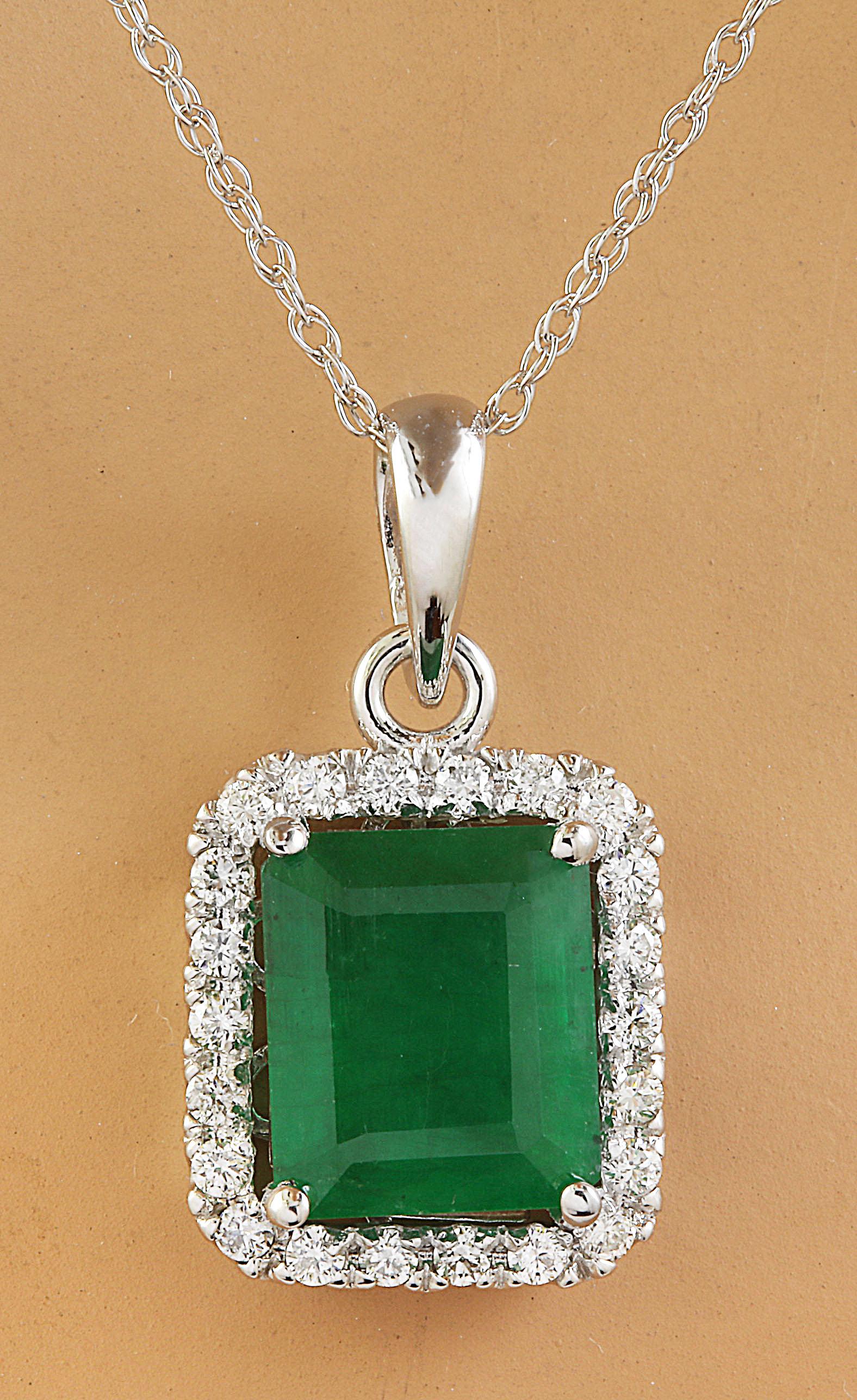 3.73 CTW Emerald 14K White Diamond Necklace: 3.73 CTW Emerald 14K White Diamond Necklace Manufacturer's Suggested Retail Price: $ 3700.00 Stamped: 14K Total Necklace Weight: 3.7 Grams Necklace Length: 18 Inches Emerald Weight: 3.37 Carat (10.30x