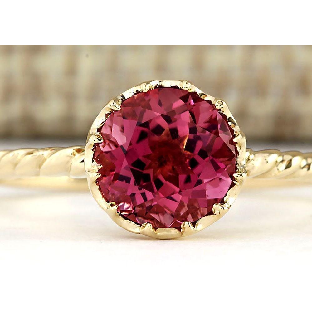 1.50 CTW Natural Pink Tourmaline Ring In 14k Yellow Gold: 1.50 CTW Natural Pink Tourmaline Ring In 14k Yellow Gold Manufacturer's Suggested Retail Price: $ 1200.00 Stamped: 14K Ring Size: 6.75 Total Ring Weight: 1.8 Grams Gemstone Weight: Total Natural Tourm