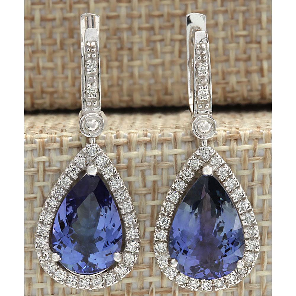 6.65 CTW Natural Tanzanite And Diamond Earrings 18K Solid White Gold: 6.65 CTW Natural Tanzanite And Diamond Earrings 18K Solid White Gold Manufacturer's Suggested Retail Price: $ 6100.00 Stamped: 18K Total Earring Weight: 4.8Grams Lenght: 1.25 inches Diamond Weight: To