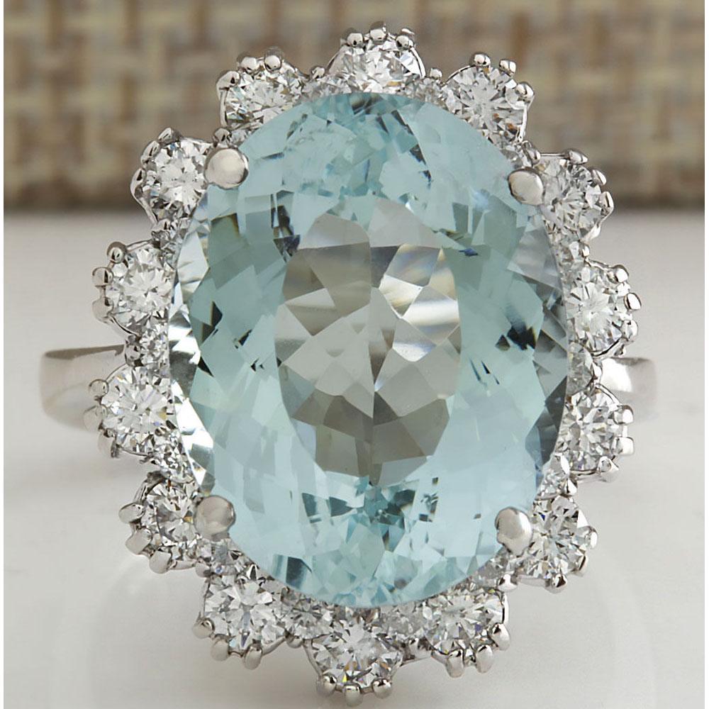 10.25 CTW Natural Aquamarine And Diamond Ring In 18K Solid White Gold: 10.25 CTW Natural Aquamarine And Diamond Ring In 18K Solid White Gold Manufacturer's Suggested Retail Price: $ 5500.00 Stamped: 18K Ring Size: 6.5 Total Ring Weight: 6 Grams Diamond Weight: Total Natu