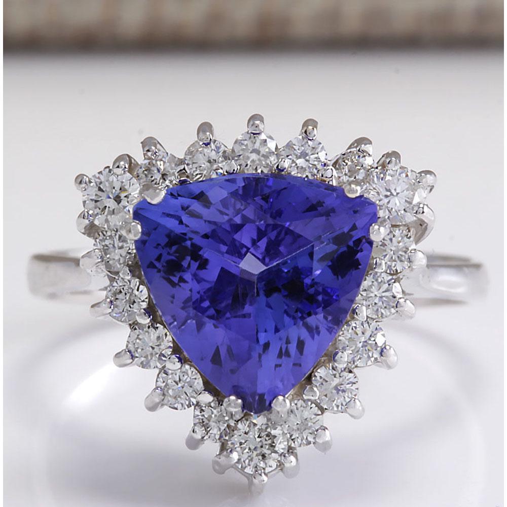 3.62 CTW Natural Blue Tanzanite And Diamond Ring In 14K Solid White Gold: 3.62 CTW Natural Blue Tanzanite And Diamond Ring In 14K Solid White Gold Manufacturer's Suggested Retail Price: $ 4100.00 Stamped: 14K Ring Size: 7 Total Ring Weight: 4.5 Grams Diamond Weight: Total N
