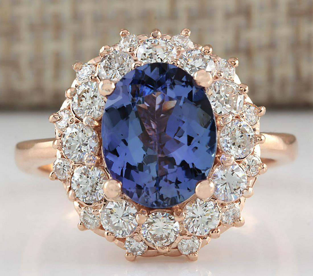 4.16 CTW Natural Blue Tanzanite And Diamond Ring In 18K Solid Rose Gold: 4.16 CTW Natural Blue Tanzanite And Diamond Ring In 18K Solid Rose Gold Manufacturer's Suggested Retail Price: $ 5600.00 Stamped: 18K Ring Size: 6.5 Total Ring Weight: 5.4 Grams Diamond Weight: Total 