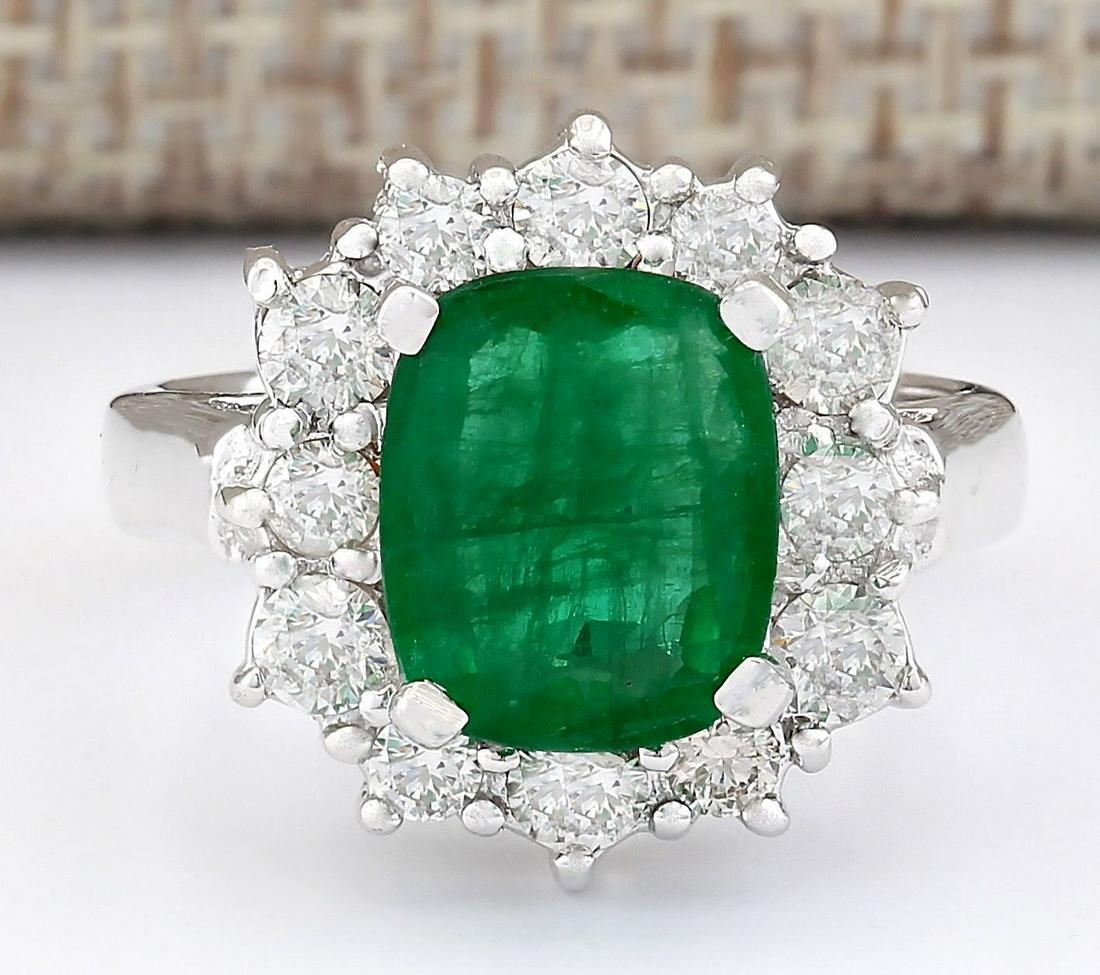 3.20 CTW Natural Emerald And Diamond Ring In 18K White Gold: 3.20 CTW Natural Emerald And Diamond Ring In 18K White Gold Manufacturer's Suggested Retail Price: $ 5400.00 Stamped: 18K Ring Size: 5 Total Ring Weight: 6.7 Grams Diamond Weight: Total Natural diamon