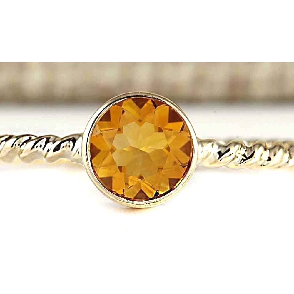 1.00 CTW Natural Citrine Ring In 18K Yellow Gold: 1.00 CTW Natural Citrine Ring In 18K Yellow Gold Manufacturer's Suggested Retail Price: $ 1200.00 Stamped: 18K Ring Size: 7 Total Ring Weight: 2.2 Grams Gemstone Weight: Total Natural Citrine Weight i