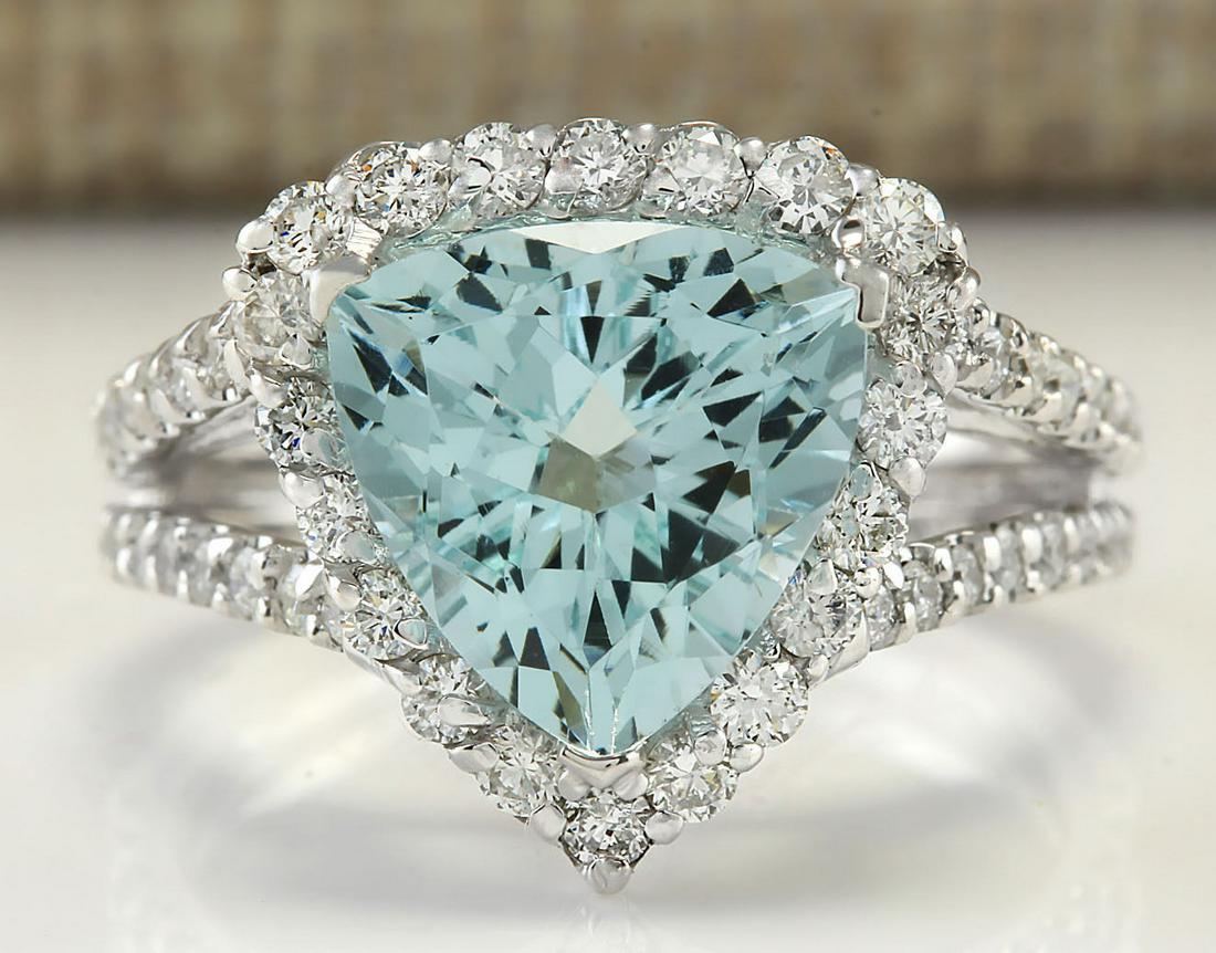 3.52 CTW Natural Aquamarine And Diamond Ring In 18K Solid White Gold: 3.52 CTW Natural Aquamarine And Diamond Ring In 18K Solid White Gold Manufacturer's Suggested Retail Price: $ 3400.00 Stamped: 18K Ring Size: 6.5 Total Ring Weight: 5.5 Grams Diamond Weight: Total Nat