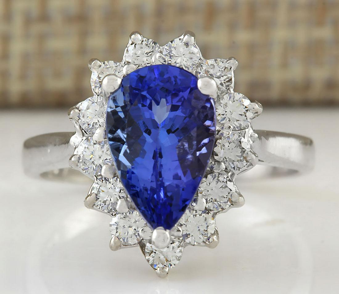 3.13 CTW Natural Tanzanite And Diamond Ring In 18K White Gold: 3.13 CTW Natural Tanzanite And Diamond Ring In 18K White Gold Manufacturer's Suggested Retail Price: $ 4300.00 Stamped: 18K Ring Size: 5.75 Total Ring Weight: 4.2 Grams Diamond Weight: Total Natural d