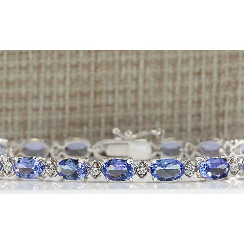 11.35 CTW Natural Tanzanite And Dimond Bracelet In 14k Solid White Gold: 11.35 CTW Natural Tanzanite And Dimond Bracelet In 14k Solid White Gold Manufacturer's Suggested Retail Price: $ 3300.00 Stamped: 14K Bracelet Width: 4.75mm Bracelet Length: 7.0 Inches Total Bracelet 