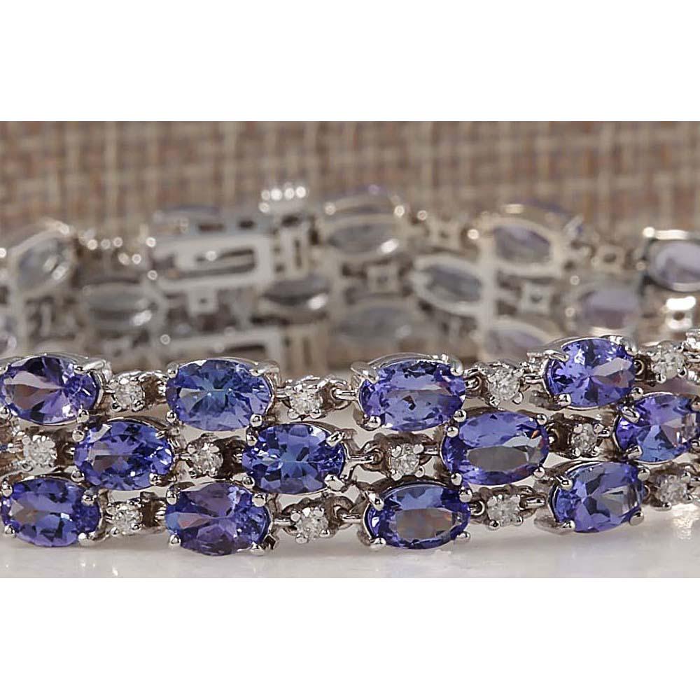 23.85CTW Natural Tanzanite And Diamond Bracelet In 14K Solid White Gold: 23.85CTW Natural Tanzanite And Diamond Bracelet In 14K Solid White Gold Manufacturer's Suggested Retail Price: $ 8300.00 Stamped: 14K Bracelet Width: 11.056mm Bracelet Length: 7.0 Inches Total Bracele