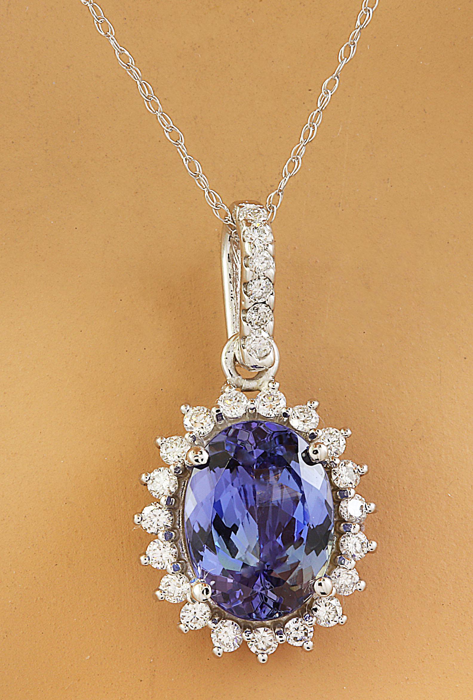 3.72 CTW Tanzanite 14K white Gold Diamond Necklace: 3.72 CTW Tanzanite 14K white Gold Diamond Necklace Manufacturer's Suggested Retail Price: $ 3200.00 Stamped: 14K Total Necklace Weight: 2.8 Grams Necklace Length: 18 Inches Tanzanite Weight: 3.27 Cara