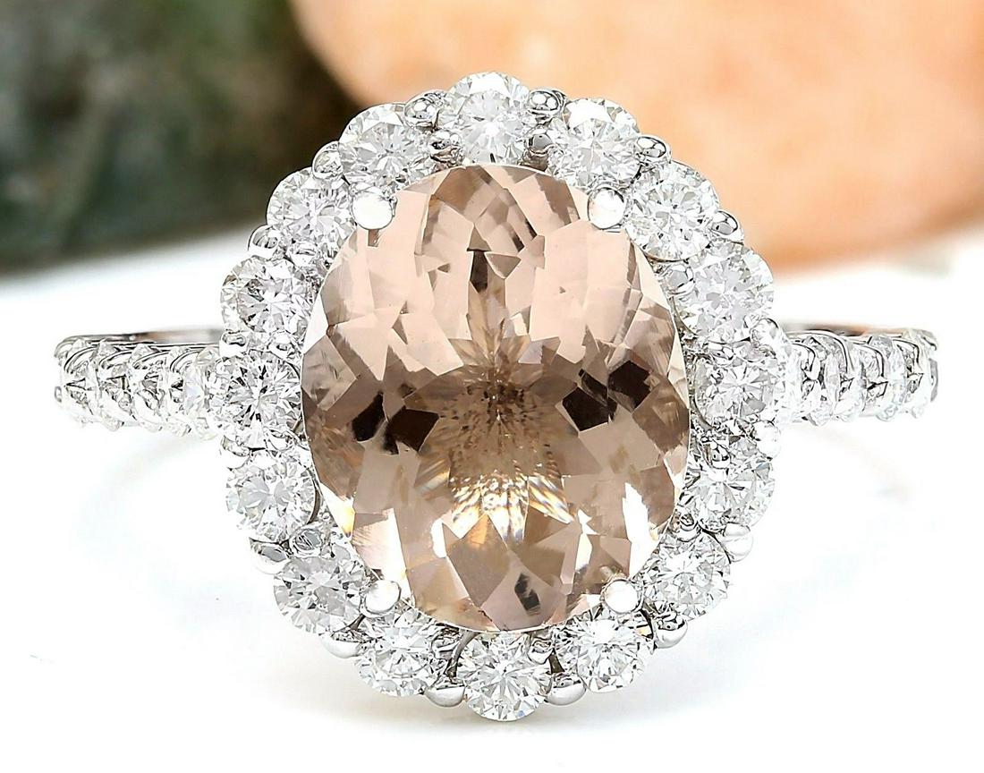 3.94 CTW Natural Morganite 18K Solid White Gold Diamond Ring: 3.94 CTW Natural Morganite 18K Solid White Gold Diamond Ring Manufacturer's Suggested Retail Price: $ 4000.00 3.94 Carat Natural Morganite 18K Solid White Gold Diamond Ring Item Type: Ring Item Style: