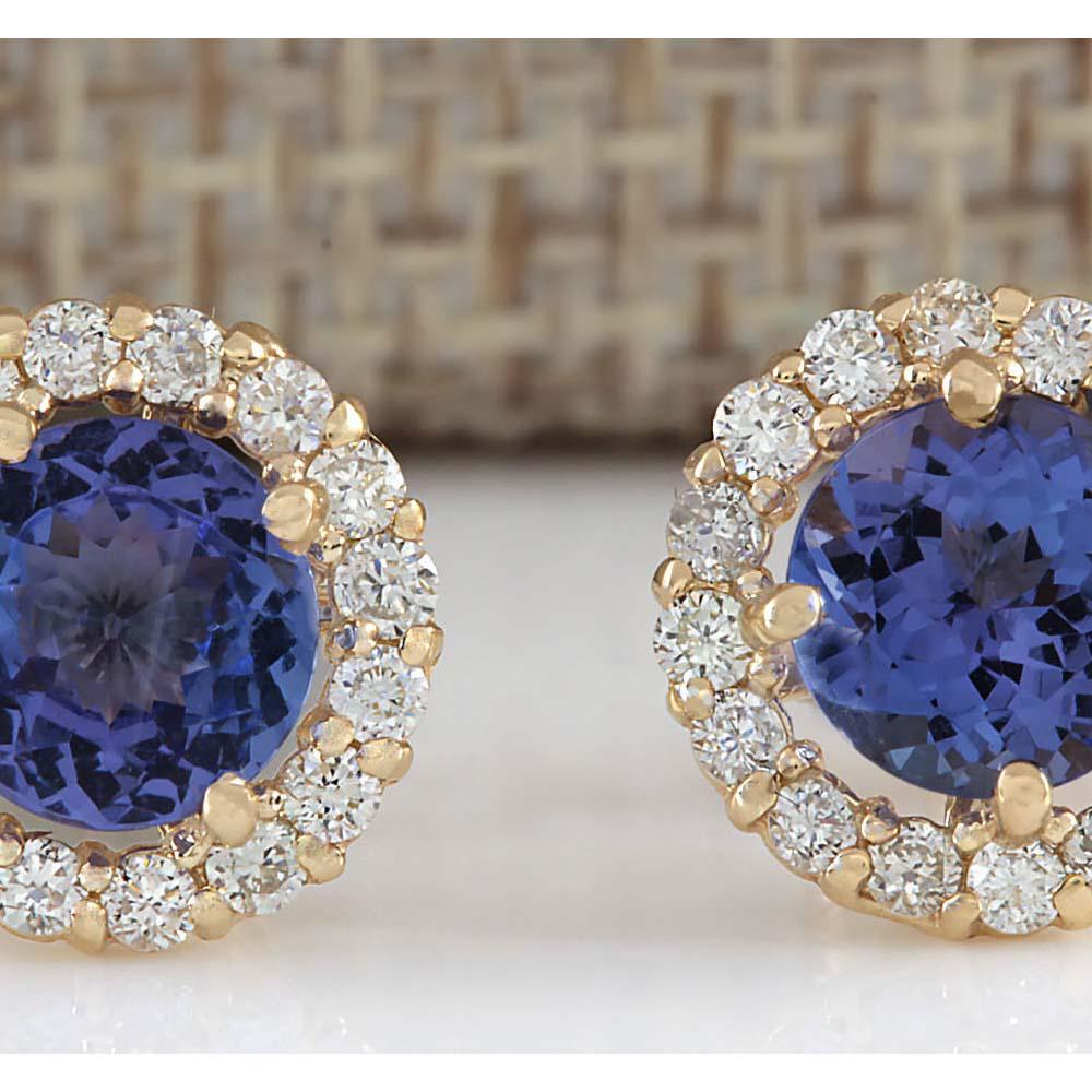 2.90CTW Natural Tanzanite And Diamond Earrings 14K Solid Yellow Gold: 2.90CTW Natural Tanzanite And Diamond Earrings 14K Solid Yellow Gold Manufacturer's Suggested Retail Price: $ 3200.00 Stamped: 14K Total Earring Weight: 1.5Grams Diamond Weight: Total Natural diamond 