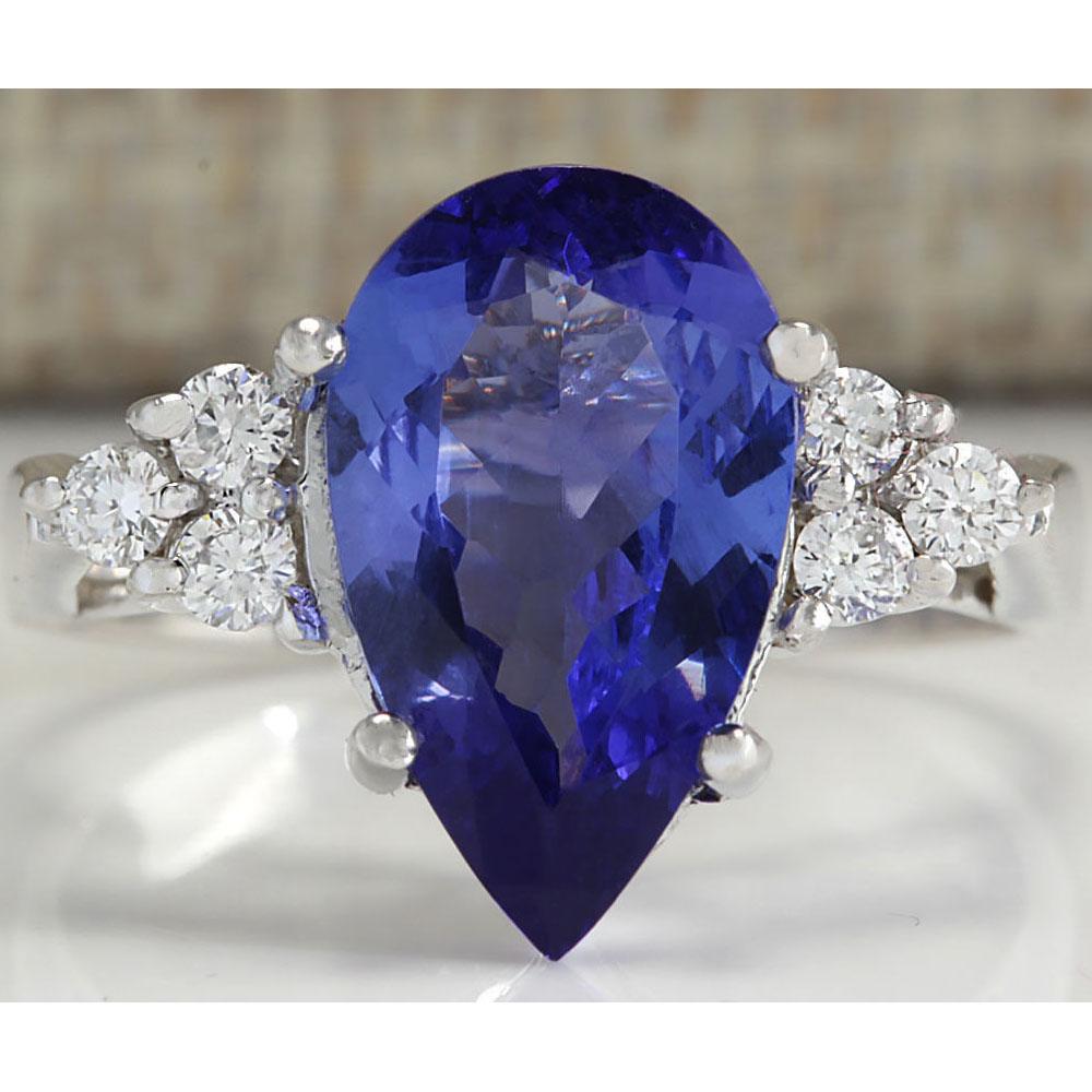 3.39 CTW Natural Blue Tanzanite And Diamond Ring In 14K White Gold: 3.39 CTW Natural Blue Tanzanite And Diamond Ring In 14K White Gold Manufacturer's Suggested Retail Price: $ 3400.00 Stamped: 14K Ring Size: 6.75 Total Ring Weight: 4.2 Grams Diamond Weight: Total Natu