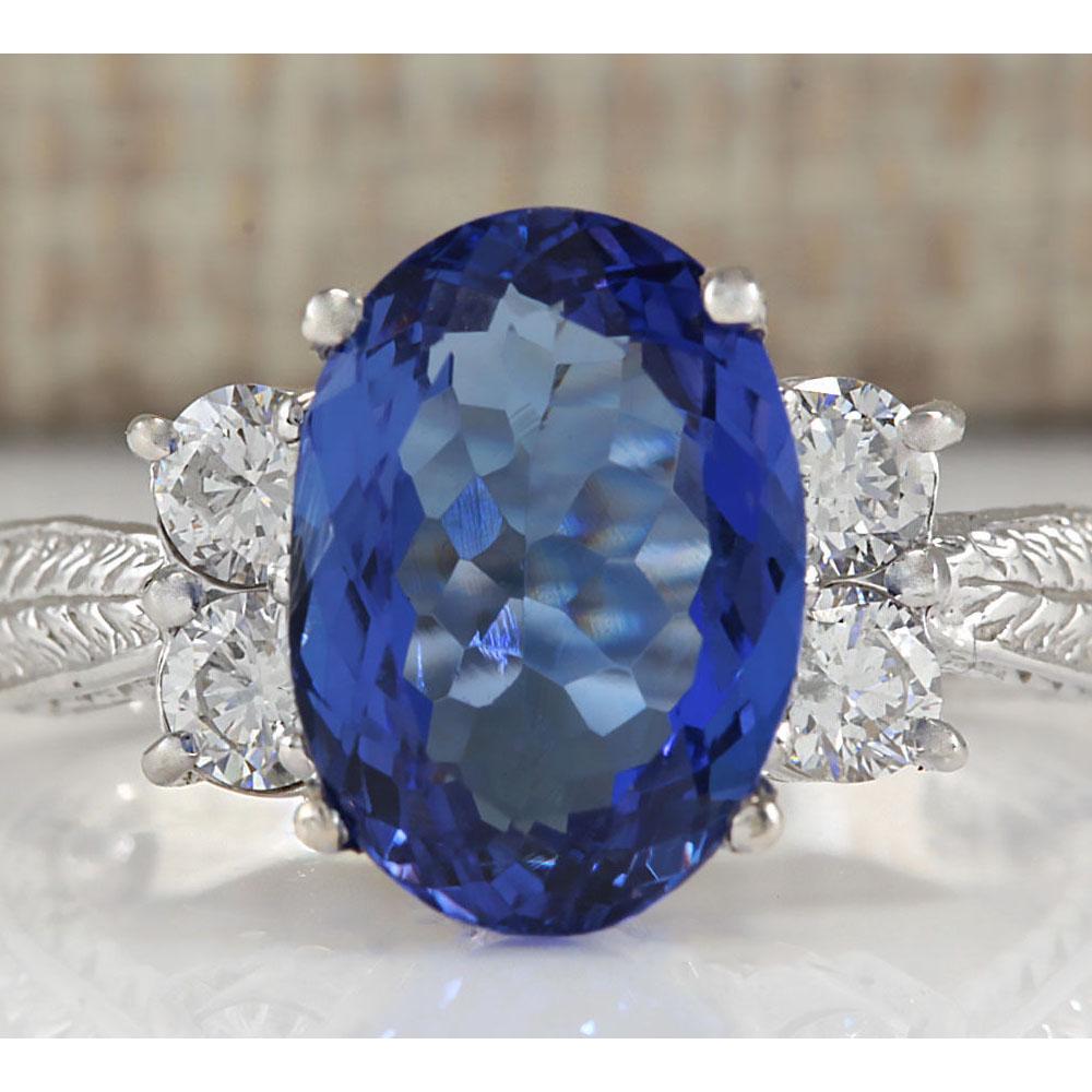 5.11 CTW Natural Tanzanite And Diamond Ring In 18K White Gold: 5.11 CTW Natural Tanzanite And Diamond Ring In 18K White Gold Manufacturer's Suggested Retail Price: $ 5400.00 Stamped: 18K Ring Size: 6.75 Total Ring Weight: 5.6 Grams Diamond Weight: Total Natural d