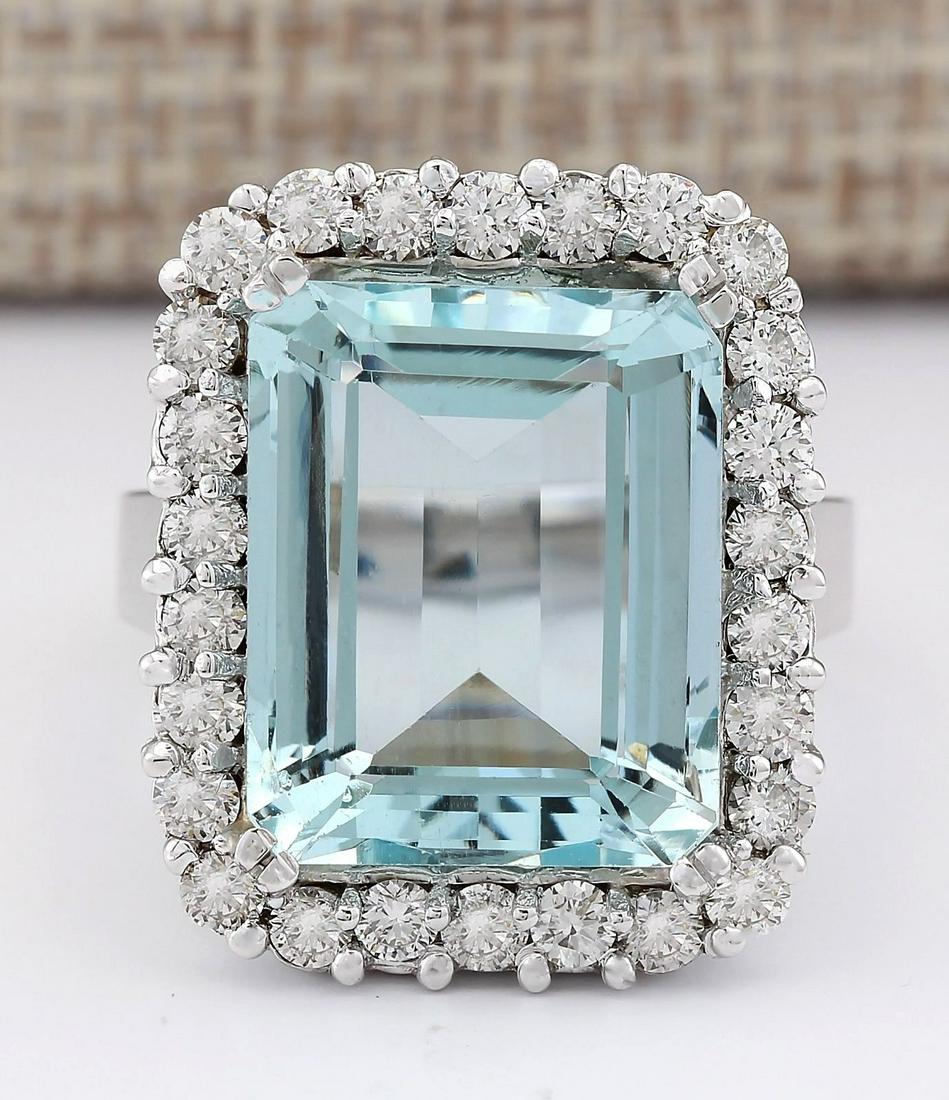 16.06 CTW Natural Aquamarine And Diamond Ring In 18K White Gold: 16.06 CTW Natural Aquamarine And Diamond Ring In 18K White Gold Manufacturer's Suggested Retail Price: $ 7700.00 Stamped: 18K Ring Size: 7 Total Ring Weight: 13 Grams Diamond Weight: Total Natural dia