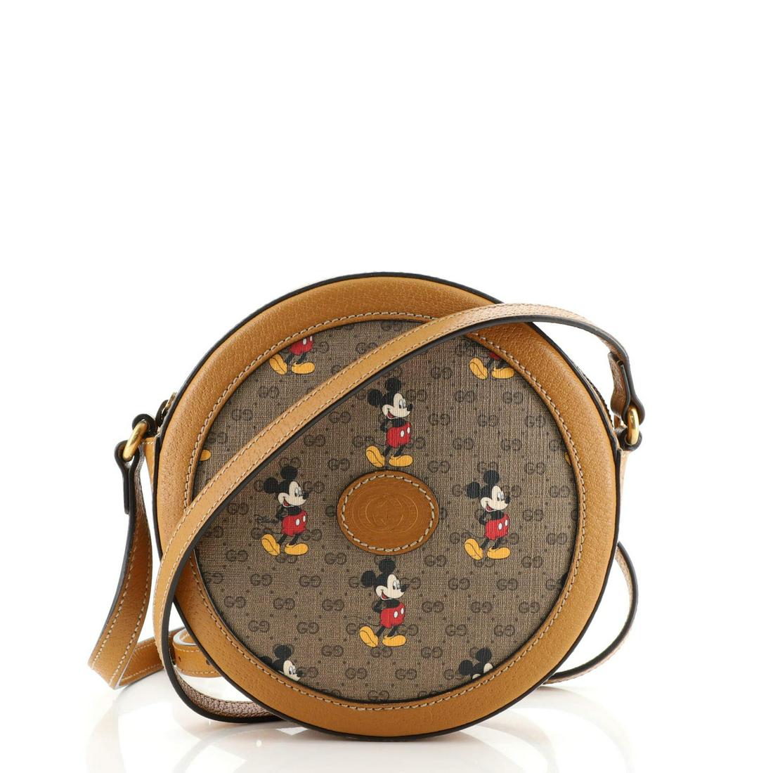 Gucci Disney Mickey Mouse Round Shoulder Bag Printed Mini GG Coated Canvas: Gucci Disney Mickey Mouse Round Shoulder Bag Printed Mini GG Coated Canvas ----- Exterior Color: Brown, Print ----- Interior Color: Neutral ----- Exterior Material: Canvas Coated, Leather ----- Interi
