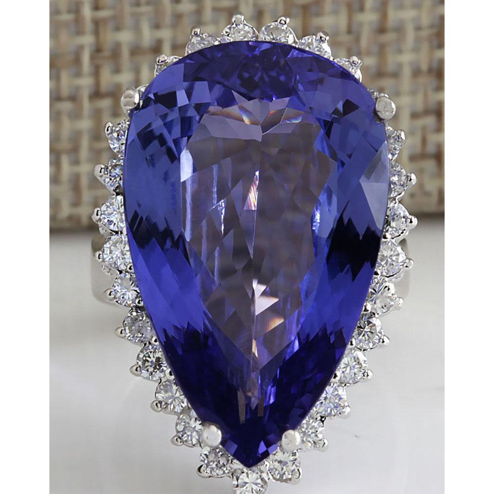 23.32 CTW Natural Tanzanite Diamond Ring 18K Solid White Gold: 23.32 CTW Natural Tanzanite Diamond Ring 18K Solid White Gold Manufacturer's Suggested Retail Price: $ 18400.00 Stamped: 18K Ring Size: 6.75 Total Ring Weight: 10 Grams Diamond Weight: Total Natural d
