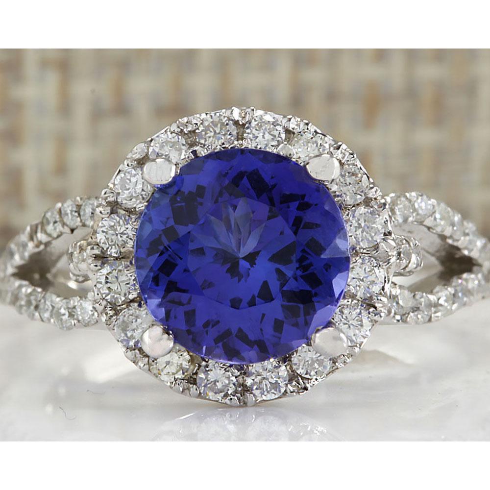 3.49 CTW Natural Blue Tanzanite And Diamond Ring In14k White Gold: 3.49 CTW Natural Blue Tanzanite And Diamond Ring In14k White Gold Manufacturer's Suggested Retail Price: $ 4200.00 Stamped: 14K Ring Size: 6.5 Total Ring Weight: 4 Grams Diamond Weight: Total Natural 