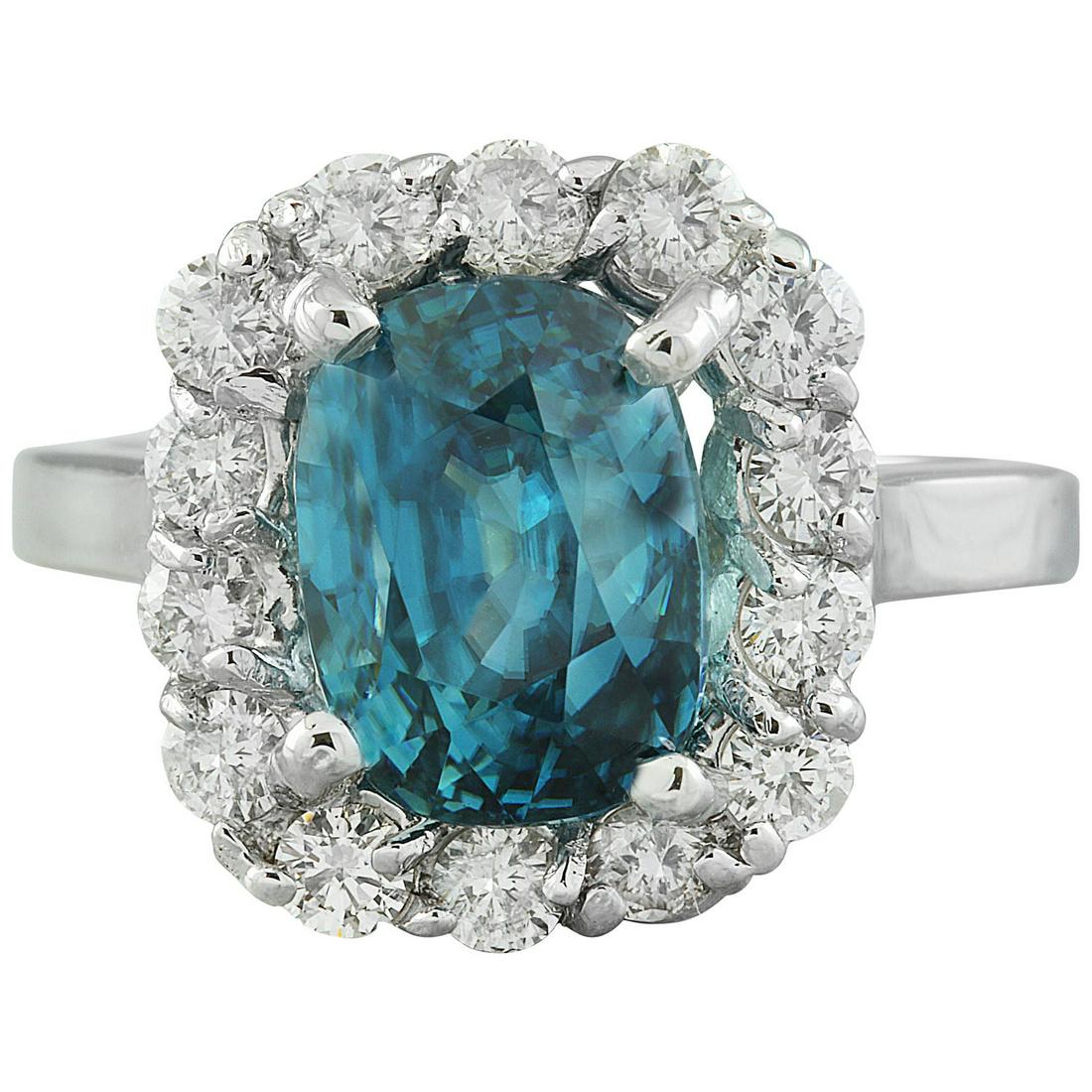 Natural 6.95 CT Zircon Diamond Ring 14K White Gold: Stamped: 14K Total Ring Weight: 6 Grams Zircon Weight 6.10 Carat (9.70x7.25 Millimeters) Diamond Weight: 0.85 carat (F-G Color, VS2-SI1 Clarity ) Face Measures: 14.30x13.05 Millimeter SKU: 14K-600580