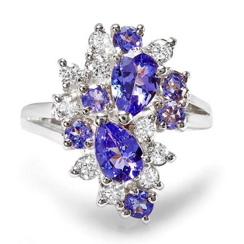 Natural Tanzanite & Diamond Ring 14K White Gold: Product Type: Ring Size: 7 Sizing lower range: 4 Sizing upper range: 12 Gender: Ladies Country of Origin: US Setting Type: Prong Main Gemstone name: Tanzanite Main Gemstone color