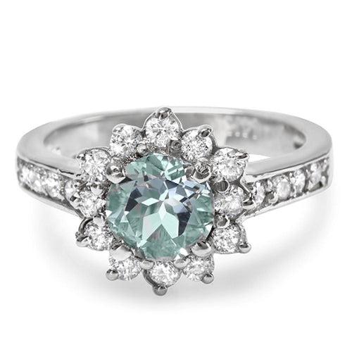 Natural Aquamarine & Diamond Ring 18K White Gold: Product Type: Ring Size: 7 Sizing lower range: 4 Sizing upper range: 12 Gender: Ladies Country of Origin: US Setting Type: Prong Main Gemstone name: Aquamarine Main Gemstone colo