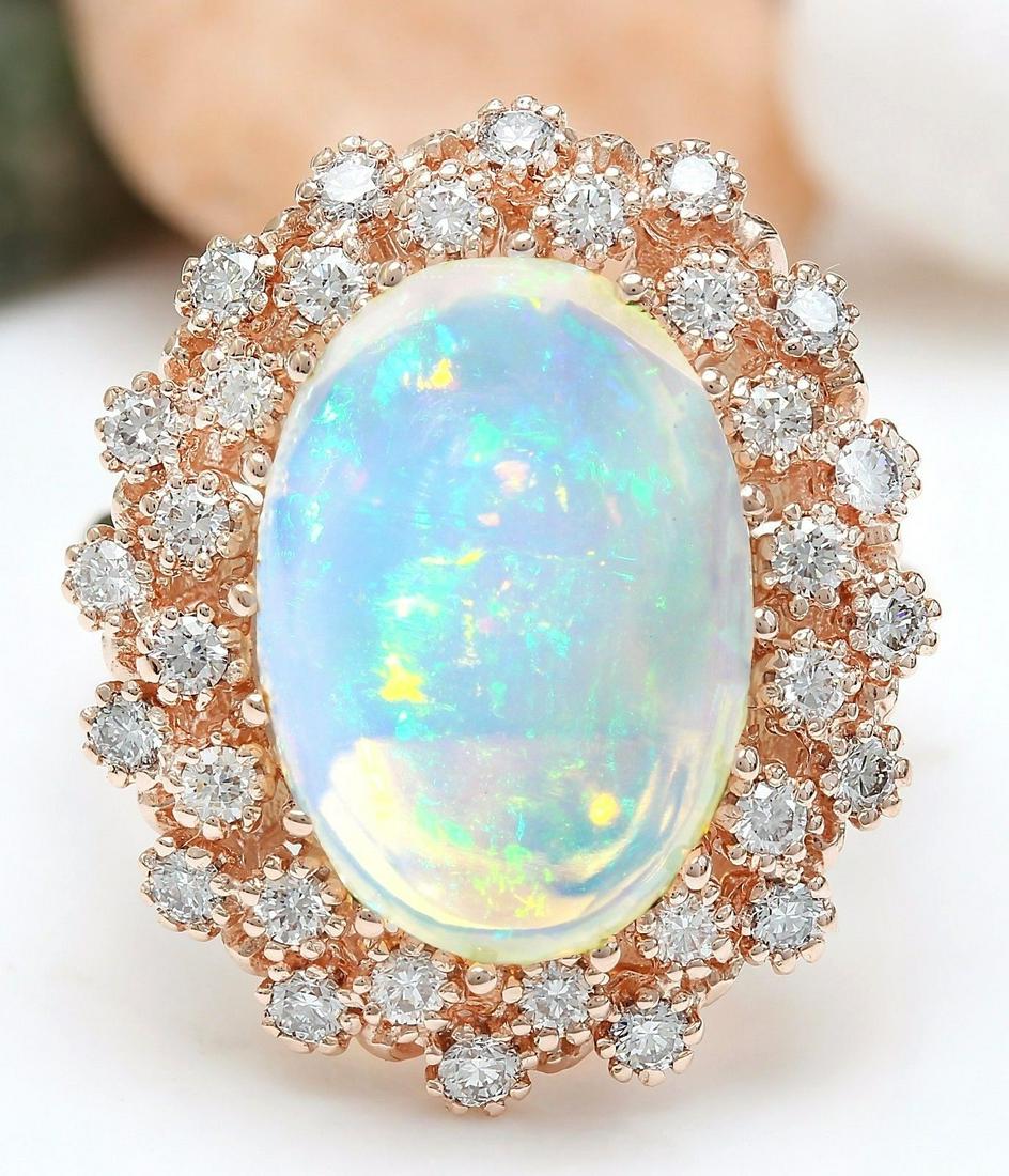 8.58 Carat Natural Opal 14K Solid Rose Gold Diamond Ring: 8.58 Carat Natural Opal 14K Solid Rose Gold Diamond RingItem Type: RingItem Style: CocktailMaterial: 14K Rose GoldMainstone: OpalStone Color: MulticolorStone Weight: 7.68 CaratStone Shape: OvalStone Q