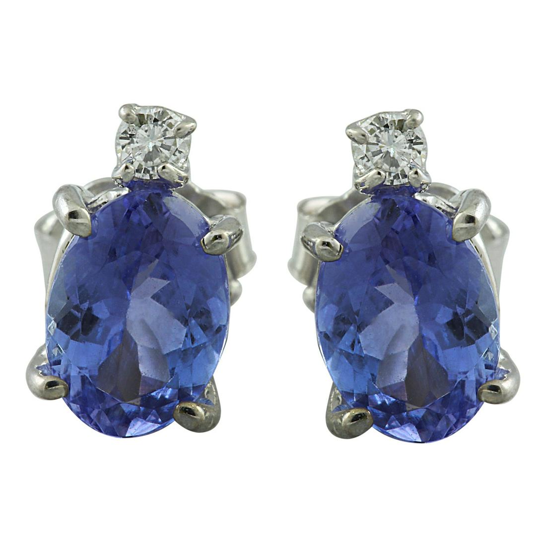 Natural 3.26 CT Tanzanite Diamond Earrings 14K White Gold: Stamped: 14K Total Earrings Weight: 1.6 Grams Tanzanite Weight: 3.20 Carat (8.90x6.40 Millimeters) Diamond Weight: 0.06 Carat (F-G Color, VS2-SI1 Clarity ) Face Measures: 11.00x6.40 Millimeters SKU: 1