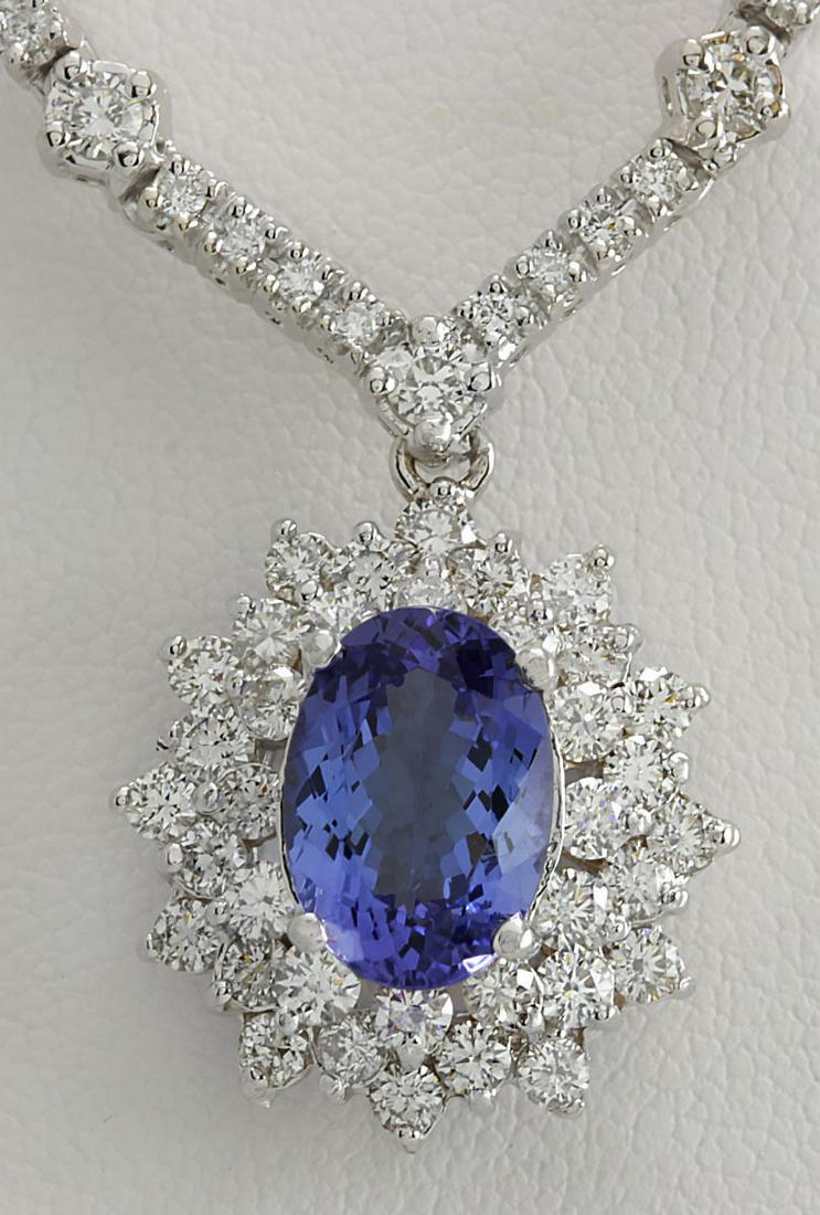 Natural 8.41 CT Tanzanite Diamond Necklace 18K White Gold: Stamped: 18K White Gold Total Necklace Weight: 22.2 Grams Necklace Length: 17 Inches Necklace Width: N/A Gemstone Weight: Total Natural Tanzanite Weight is 3.31 Carat (Measures: 11.25x7.82 mm) Color: 