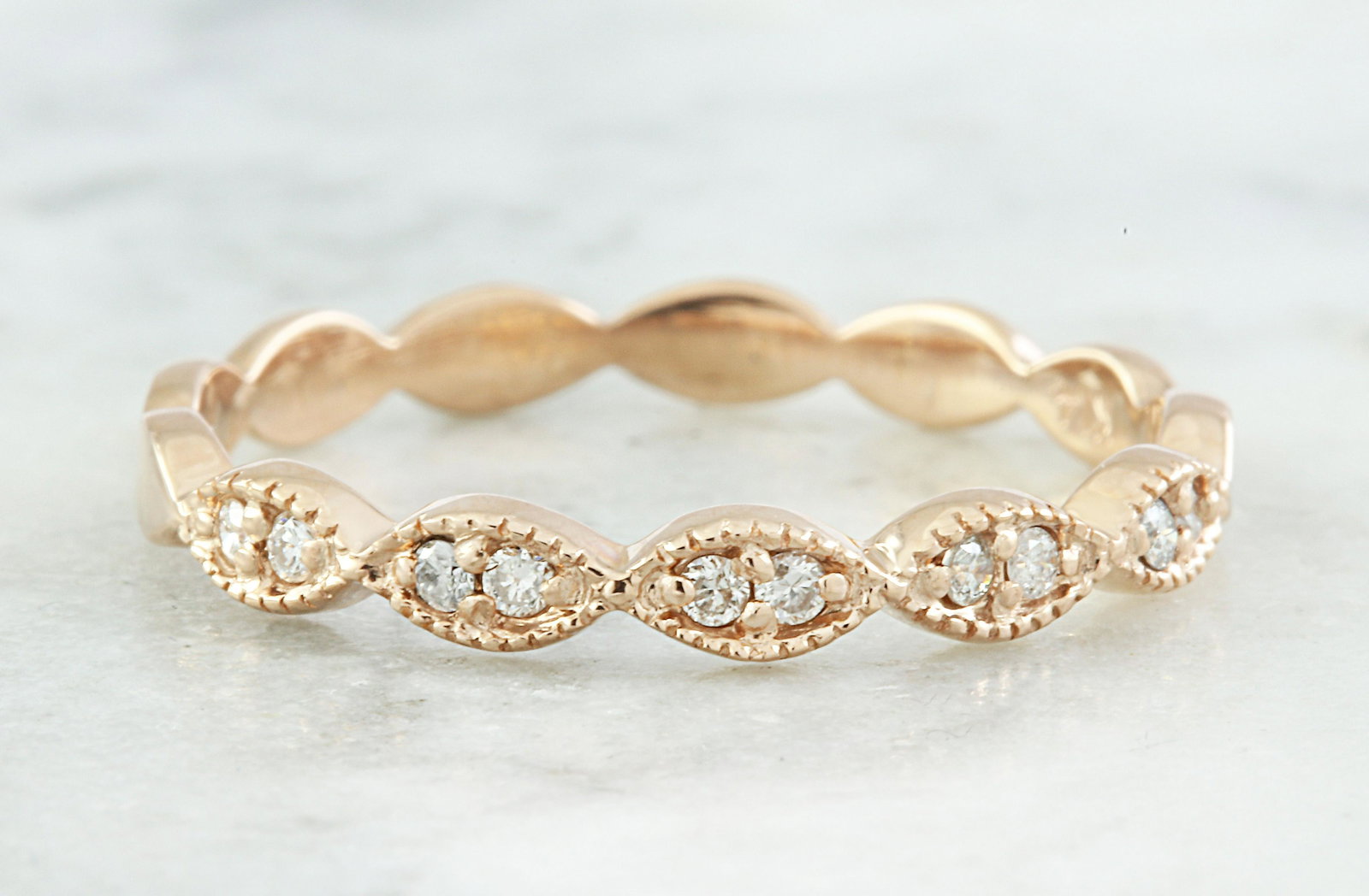 0.15 Carat Diamond 14K Rose Gold Ring: Stamped: 14K Total Ring Weight: 1.3 Grams Diamond Weight: 0.15 carat (F-G Color, VS2-SI1 Clarity ) Face Measures: 2.65 Millimeter SKU: [6001055]