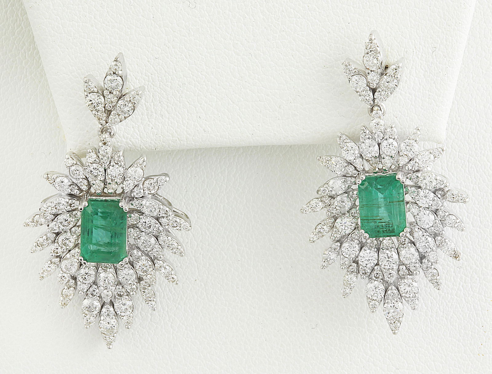4.51 Carat Emerald 18K White Gold Diamond Earrings: Stamped: 18K Total Earrings Weight: 10 Grams Emerald Weight: 2.05 Carat (7.00x5.00 Millimeters) Diamond Weight: 2.46 Carat (F-G Color, VS2-SI1 Clarity ) Length: 1.30 Inches Face Measures: 26.00x18.90