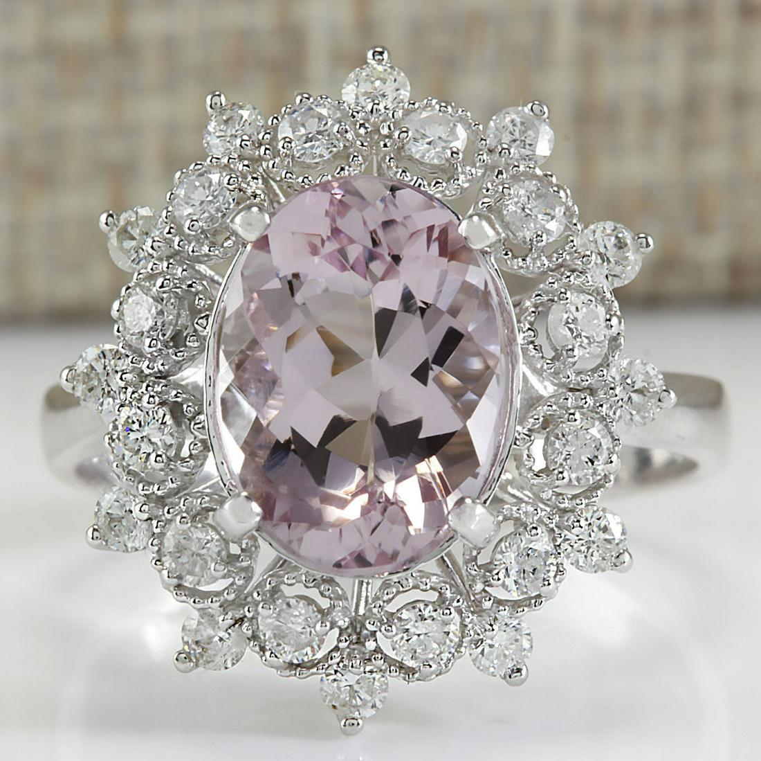 3.68Carat Natural Morganite And Diamond Ring In 14K White Gold: Stamped: 14K Ring Size: 7.5 Total Ring Weight: 4.4 Grams Diamond Weight: Total natural diamond weight is .70carat. VS2-SI1 clarity / F-G color Gemstone Weight: Total Natural Morganite Weight is 2.98ct