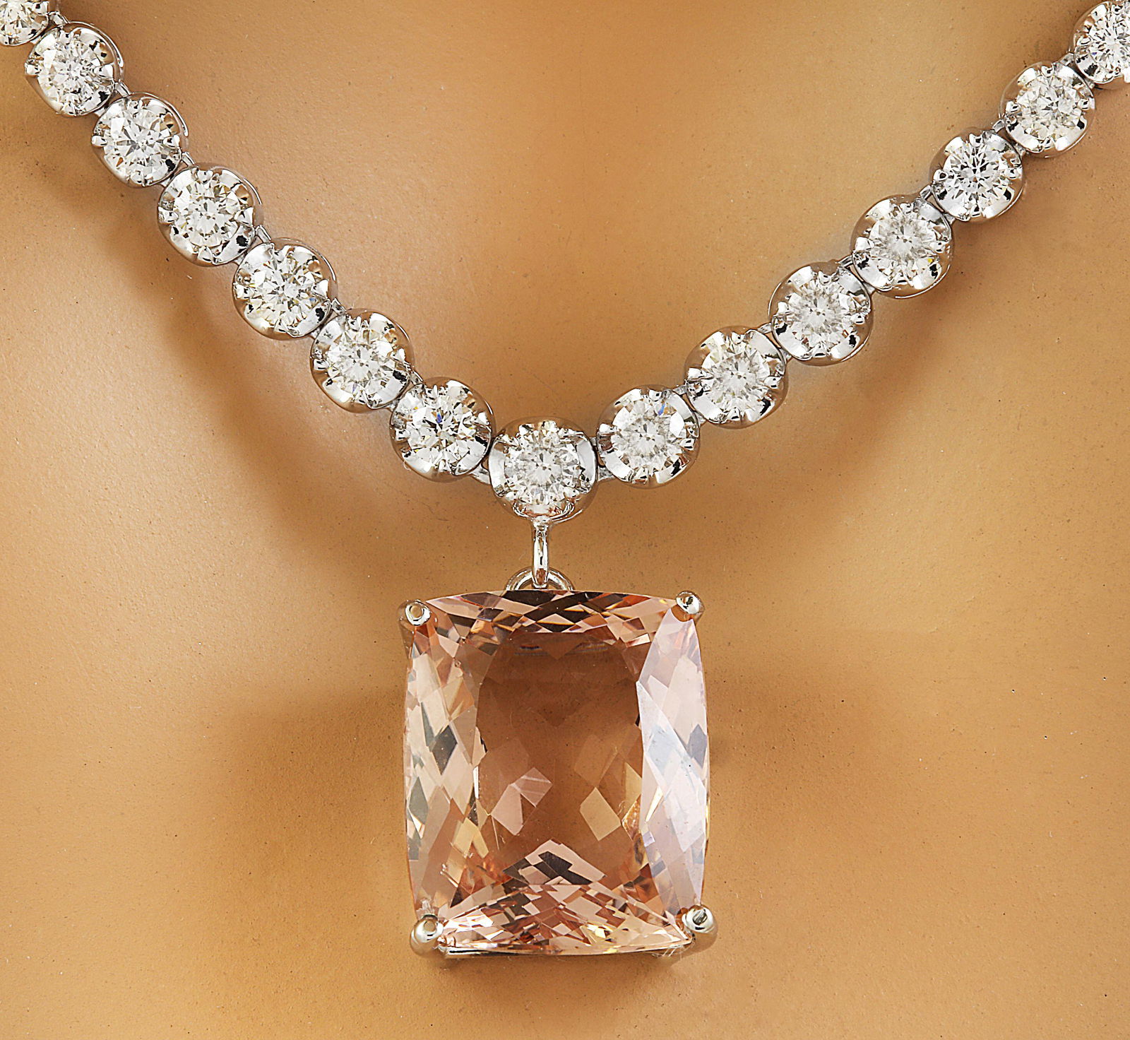 12.60 Carat Morganite 14K White Gold Diamond Necklace: 12.60 Carat Morganite 14K White Gold Diamond Necklace Stamped: 14K Total Necklace Weight: 22.4 Grams Necklace Length: 16.5 Inches Morganite Weight: 9.00 Carat (16.20x13.00 Millimeters) Diamond Weight: