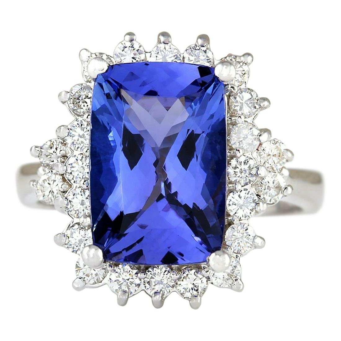 5.55 Carat Natural Tanzanite 14K White Gold Diamond Ring: 5.55 Carat Natural Tanzanite 14K White Gold Diamond Ring Stamped: 14K White Gold Total Ring Weight: 6.2 Grams Ring Length: N/A Ring Width: N/A Gemstone Weight: Total Natural Tanzanite Weight is 4.80 C