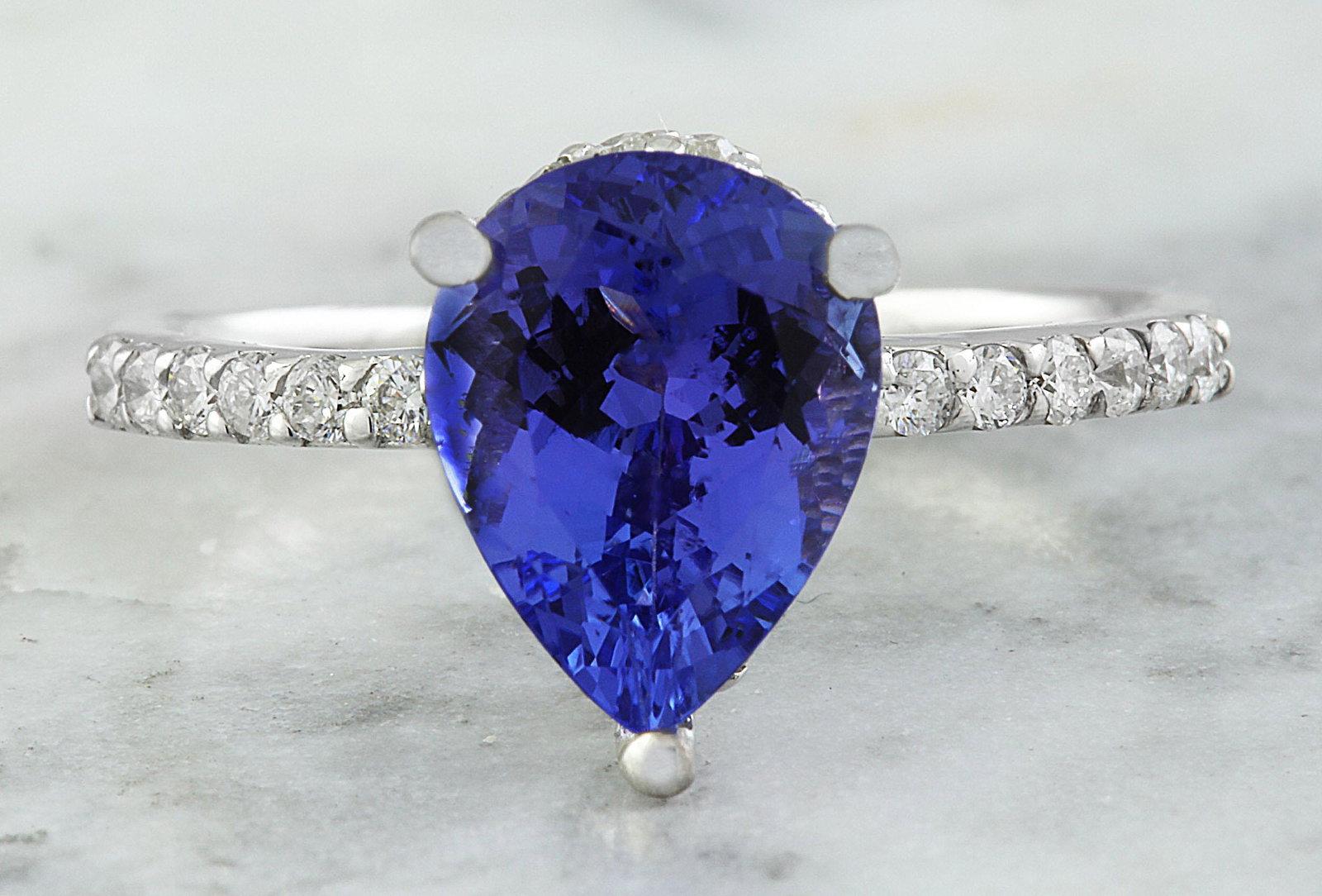 2.95 Carat Tanzanite 18K White Gold Diamond Ring: 2.95 Carat Tanzanite 18K White Gold Diamond Ring Stamped: 18K Total Ring Weight: 3.2 Grams Tanzanite Weight 2.65 Carat (10.20x7.80 Millimeters) Diamond Weight: 0.30 carat (F-G Color, VS2-SI1 Clarity )