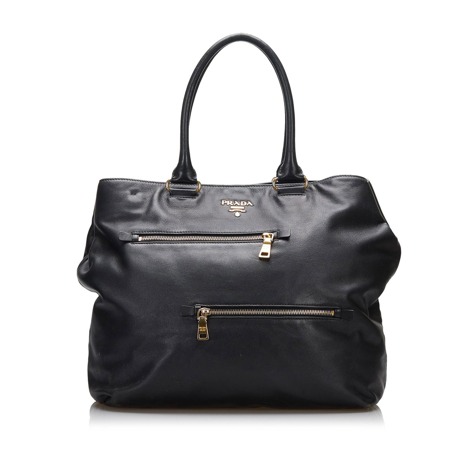 Prada Vitello Daino Tote Bag: Prada Vitello Daino Tote Bag // Founded by Mario Prada in 1913, the Italian fashion label of Prada is renowned for its original, yet practical designs. Each piece of the collection is meticulously cra