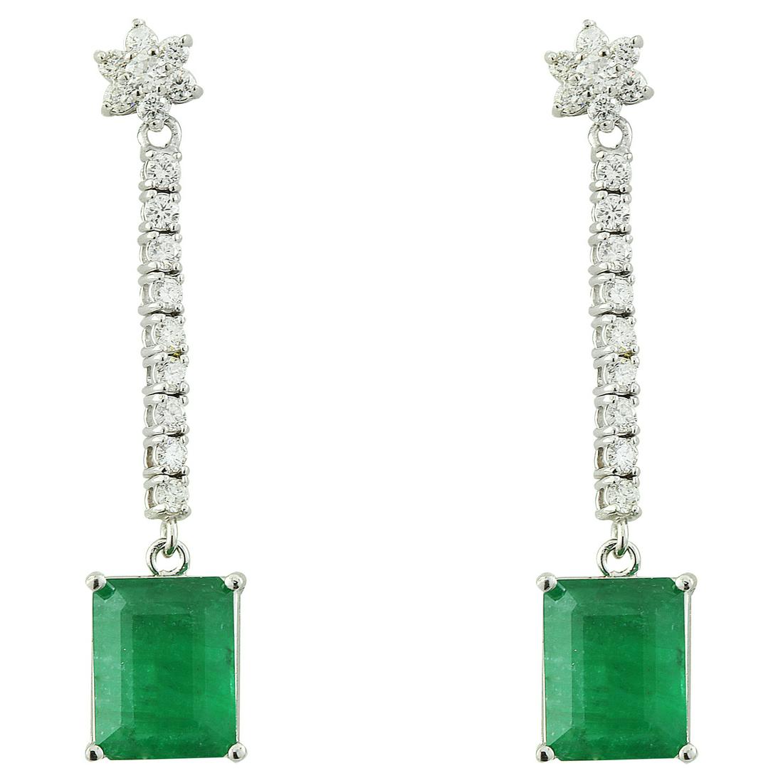 5.87 Carat Emerald 18K White Gold Diamond Earrings: 5.87 Carat Emerald 18K White Gold Diamond Earrings Stamped: 18K Total Earrings Weight: 4 Grams Emerald Weight: 5.07 Carat (10.00x8.00 Millimeters) Diamond Weight: 0.80 Carat (F-G Color, VS2-SI1 Clarit