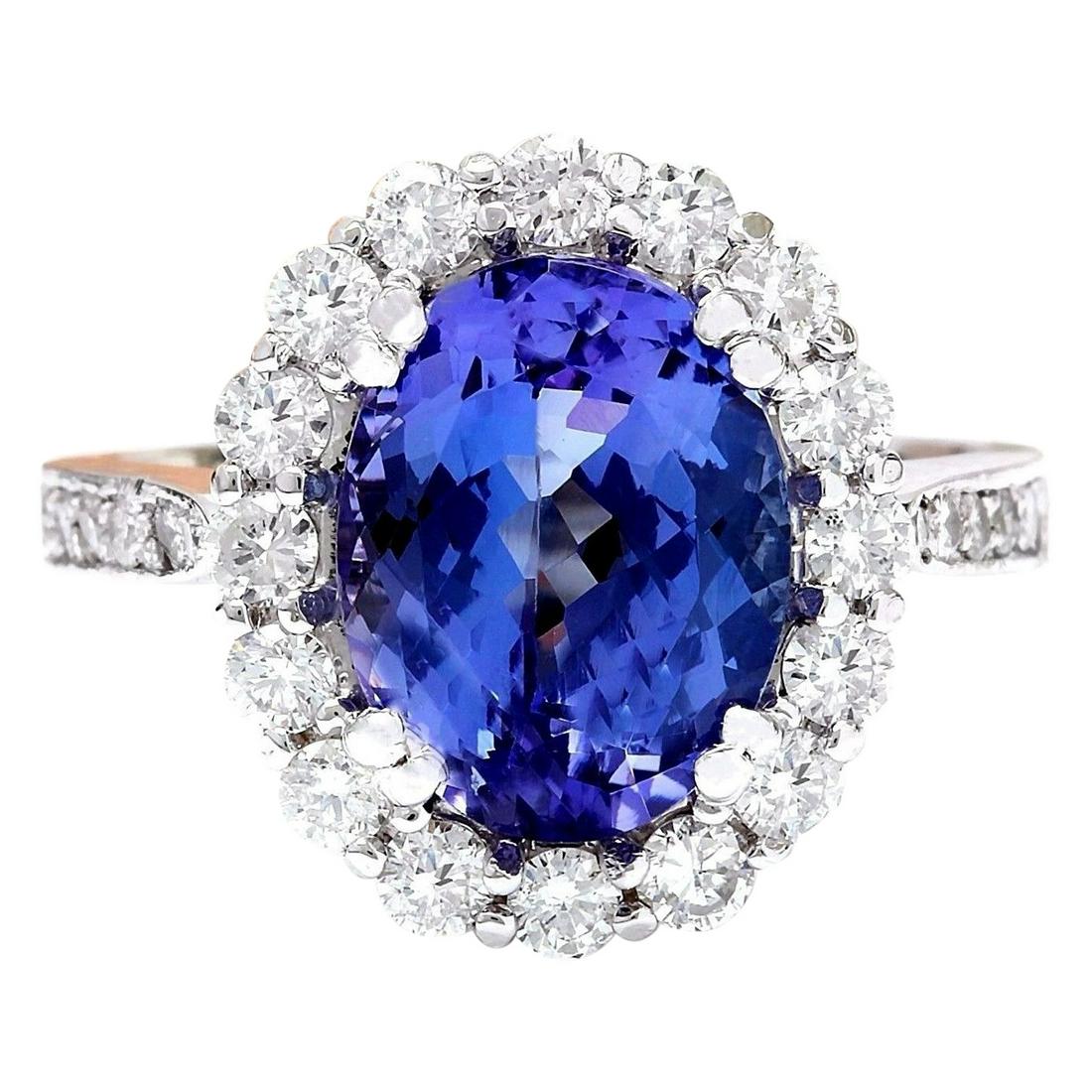 4.94 Carat Natural Tanzanite 18K White Gold Diamond Ring: 4.94 Carat Natural Tanzanite 18K White Gold Diamond Ring 4.94 Carat Natural Tanzanite 18K Solid White Gold Diamond RingItem Type: RingItem Style: EngagementMaterial: 18K White GoldMainstone: Tanzanite