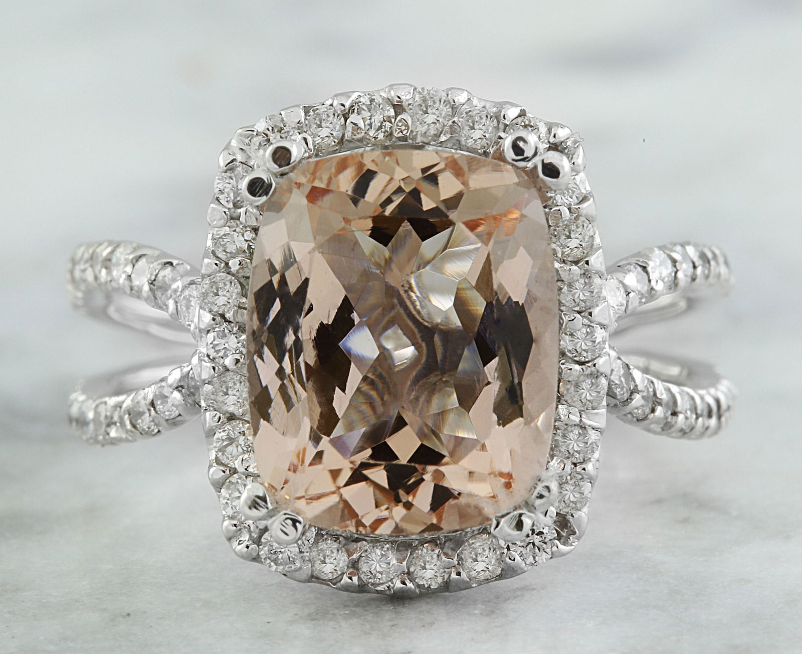 4.93 Carat Morganite 18K White Gold Diamond Ring: 4.93 Carat Morganite 18K White Gold Diamond Ring Stamped: 18K Total Ring Weight: 5.7 Grams Morganite Weight: 4.23 Carat (11.00x9.00 Millimeters) Diamond Weight: 0.70 Carat (F-G Color, VS2-SI1 Clarity
